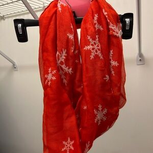 Beverly infinity scarf red with white snowflakes.